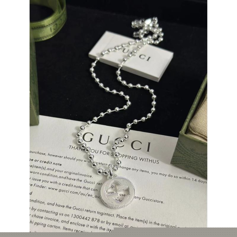G*u*i necklaces